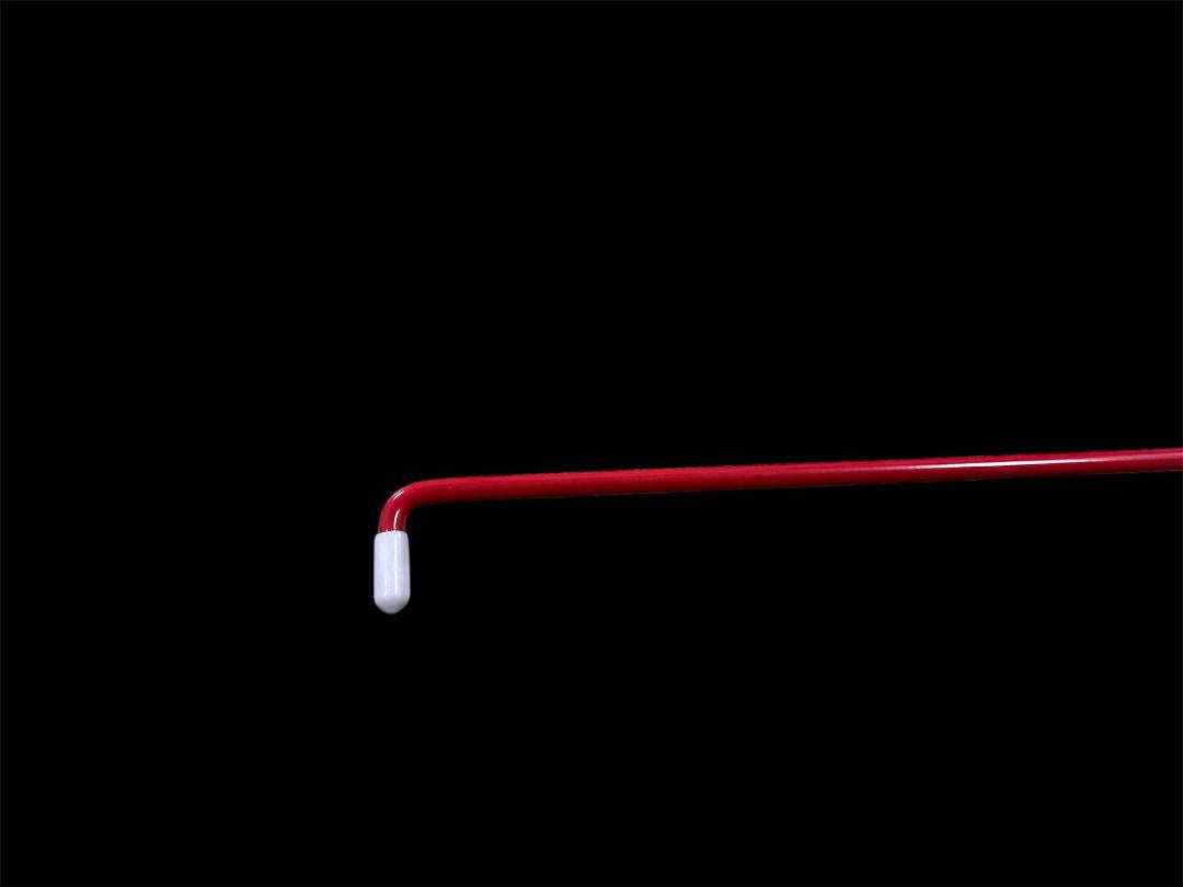 This tool is a 55 inch steel rod coated in a high visibility powder coating. Because of its long length, this Tool is ideal for depressing the unlock button, accessing the pull handle, and lifting the lock button. It can get into all the tight spaces. The smooth plastic non-marring wedge does not damage the door or weather stripping. Made in USA. Tip View
