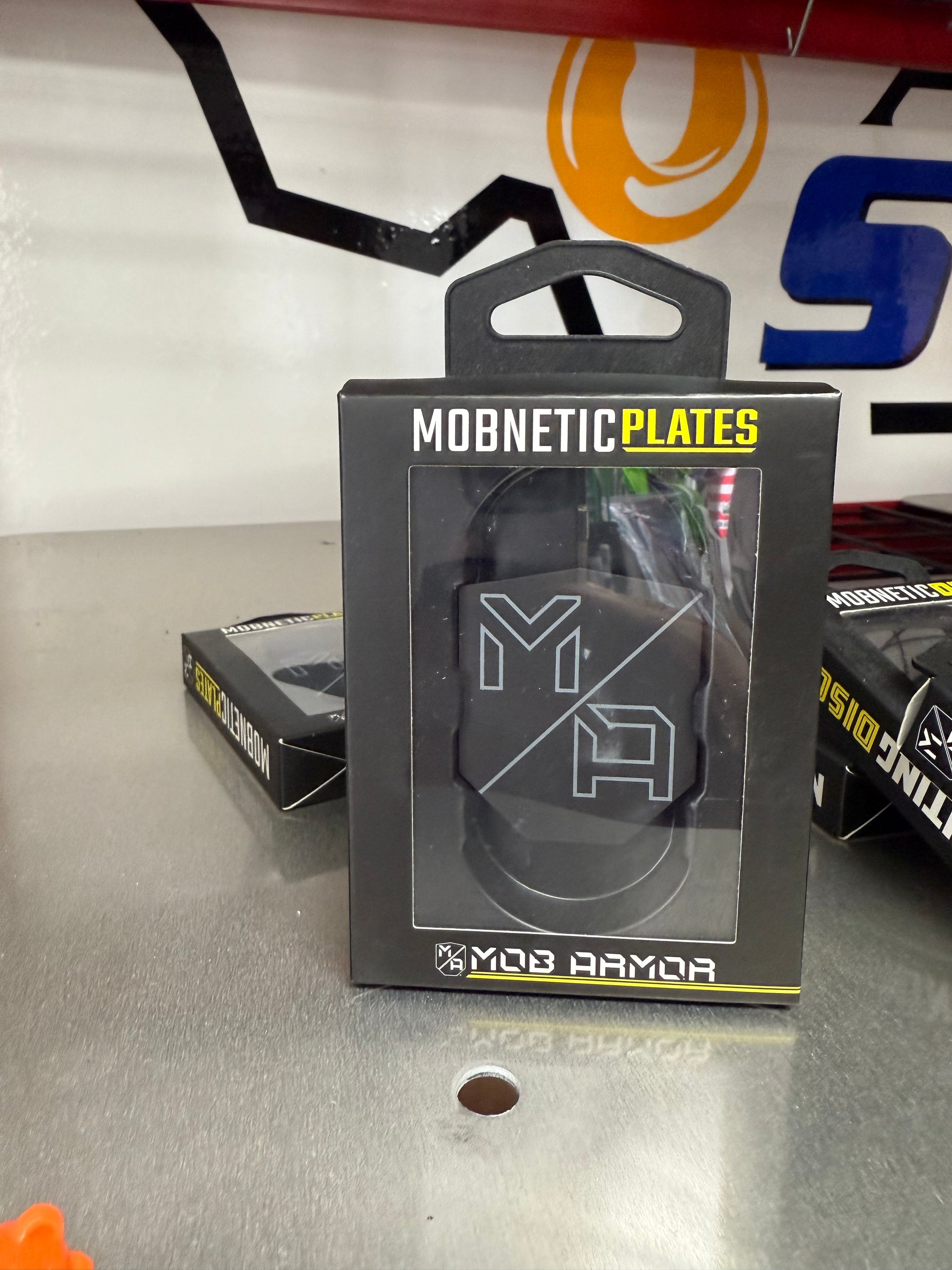 Expand your mounting options with the Mob Armor Mobnetic Plates. These steel replacement plates are designed to work with ant Mob Armor Mobnetic mount, allowing you to easily attach your device in multiple vehicles, toolboxes, or workstations. Perfect for drivers who use their mount across several setups.

NOTE: THIS PRODUCT INCLUDES 2 PLATES ONLY. MOBNETIC MOUNT SOLD SEPERATLEY. FRONT VIEW OF PACKAGING